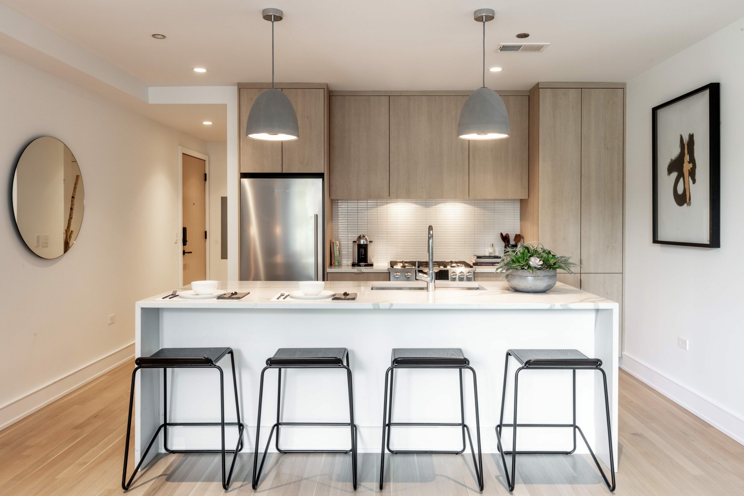 No. 508 Lincoln Park Apartment's beautiful marble countertops and wood-made cabinets.