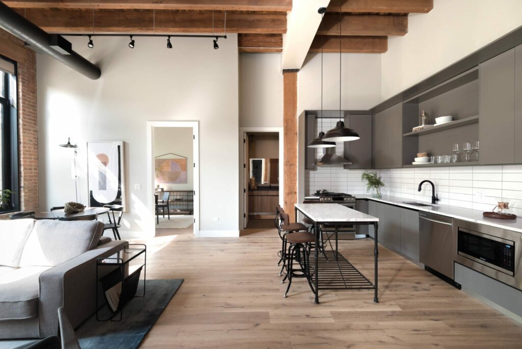 Germain House offers loft architecture with authentic brick and beams. Photo credit: Kaitlin Brewer